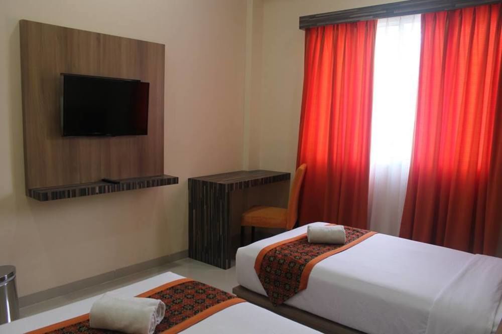 New D'Dhave Hotel Padang Kültér fotó